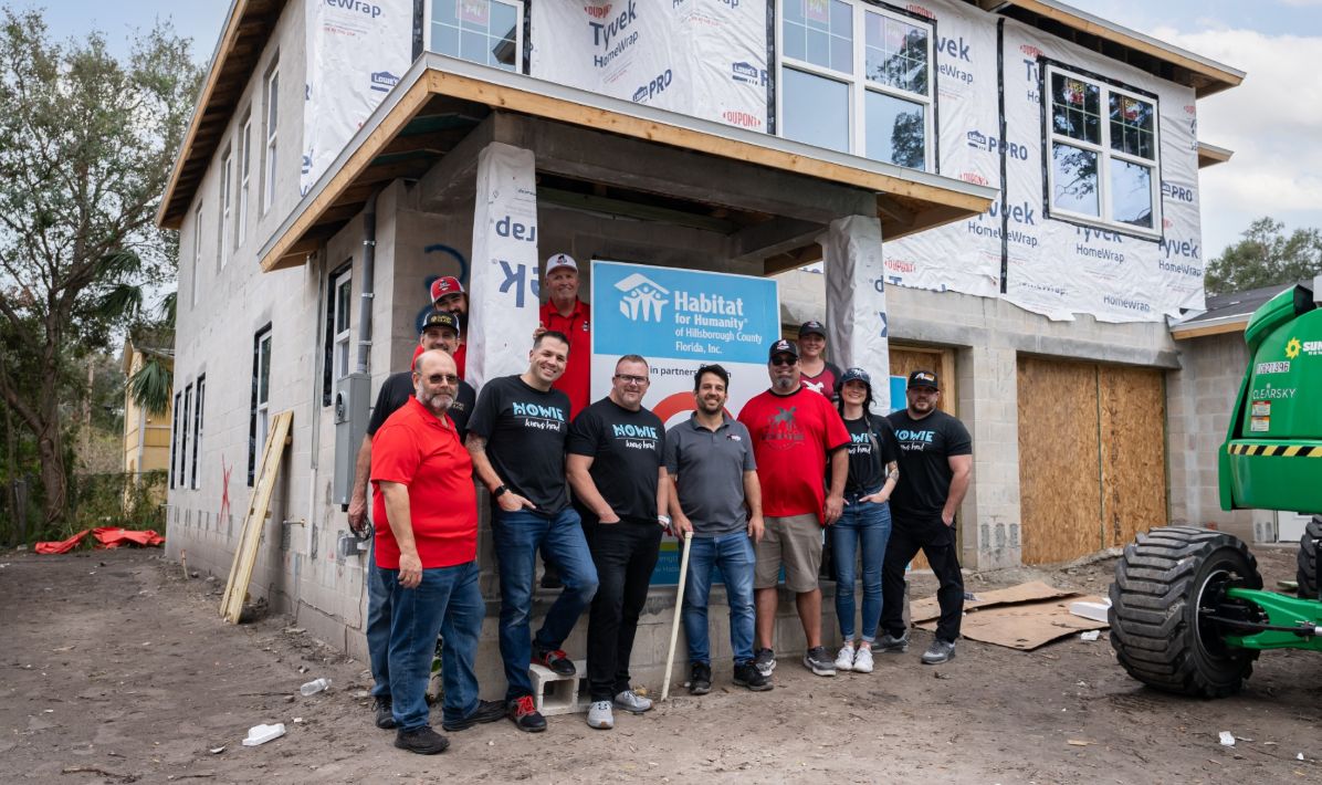 Mighty Dog Roofing helps with a Habitat for Humanity home build.