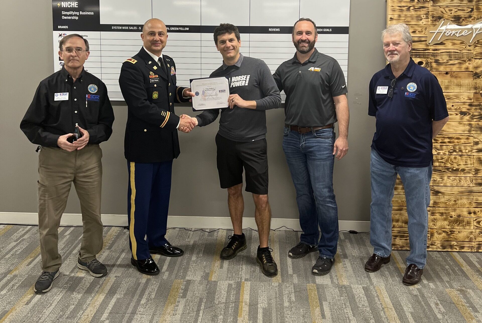 Tony Hulbert, CEO of HorsePower Brands, accepts the Patriot Award by the Employer Support of the Guard and Reserve (ESGR).